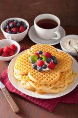 waffles with creme fraiche and berries for breakfast