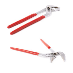 Set of metal plumber wrench over white isolated background