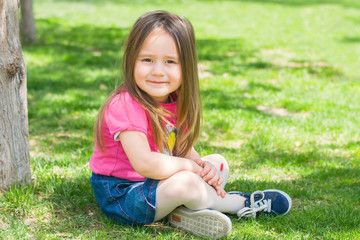Fototapeta premium beautiful little girl outdoors