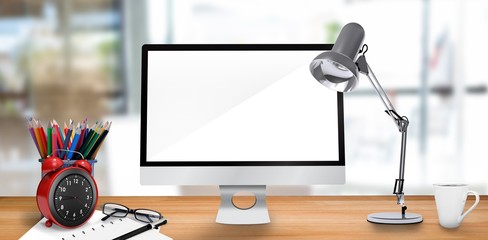 Composite image of laptop on a table