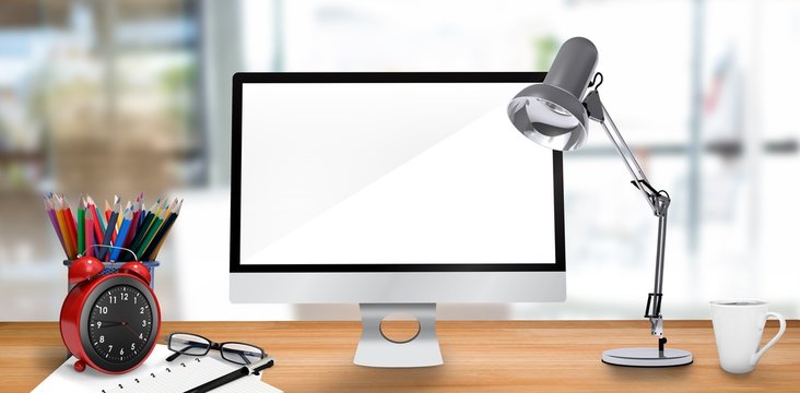 Composite image of laptop on a table