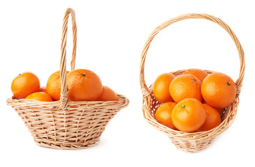 Wicker basket full of multiple ripe fresh juicy tangerines, composition isolated over the white background