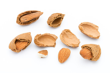 Group of almond nuts. Isolated on a white background.