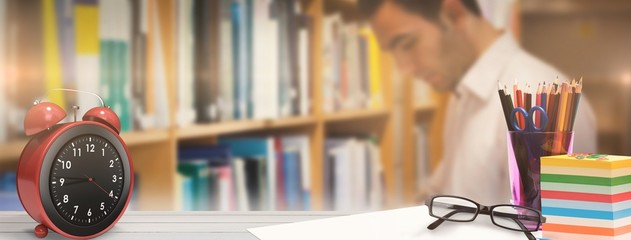 Composite image of school supplies on desk