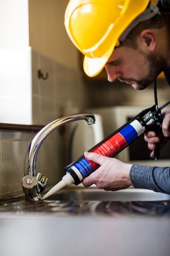 Pest control man using pest control injection