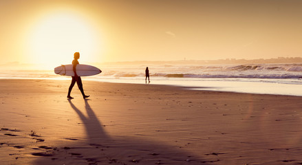Surfers on the beach