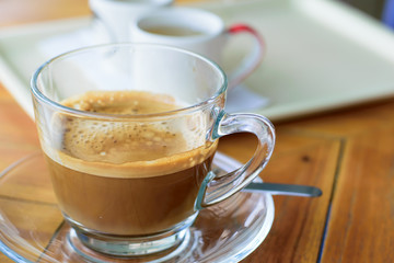 coffee with cream on table