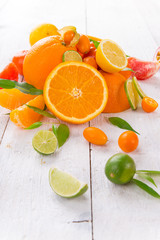 Citrus fruits on a wooden table.