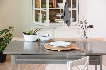 white kitchen and metal table