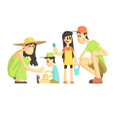 Family Of Four In Sandbox