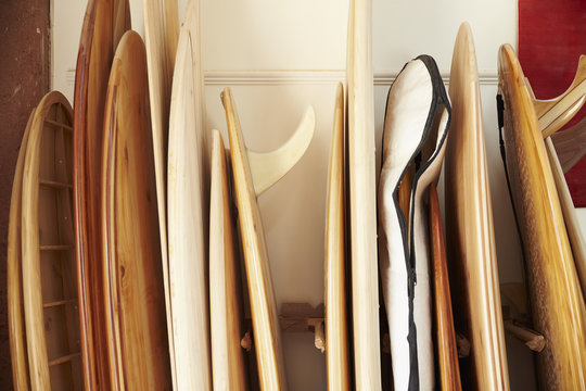 Row Of Handmade Boards In Bespoke Surfboard Workshop