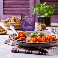 Chickpeas cooked with  sauce