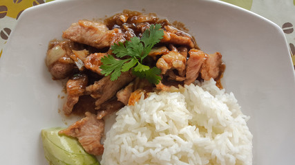 Fried pork and garlic on the rice