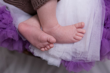 The feet of a newborn baby