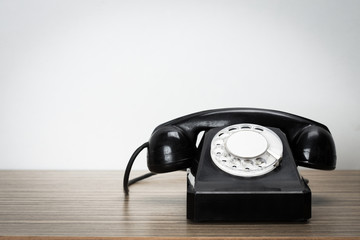 Retro telephone on table