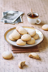 Chocolate Chip Cookies on a plate and a cup of coffee.