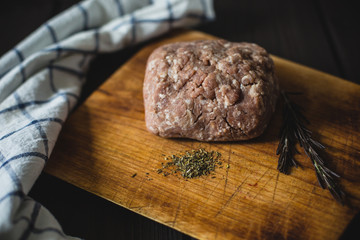 minced meat on wooden table