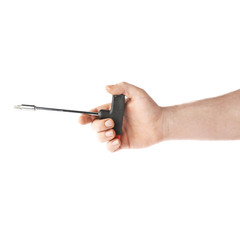 Hand holding a T-shape screwdriver tool, composition isolated over the white background