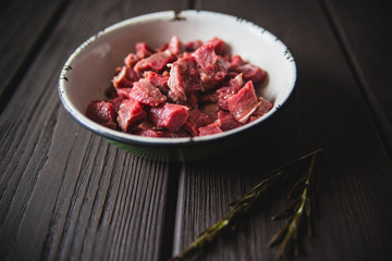 minced meat on wooden table