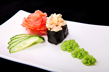 Sushi roll on white plate