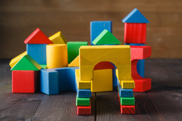 Obraz premium building from wooden colourful childrens blocks