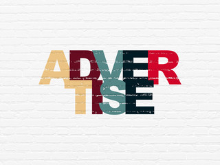 Marketing concept: Advertise on wall background