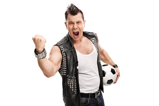 Football hooligan holding a ball and shouting