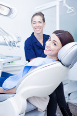 At the dentist. Female dentist in action.
Sharpen on woman