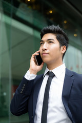 Businessman talk to mobile phone