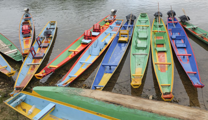 Fototapeta na wymiar boats in Nam Song river at Vang Vieng, Laos