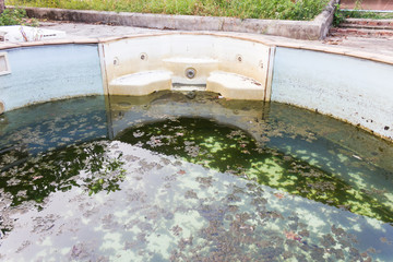 Abandoned and unclean swimming pool