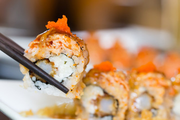 Sushi roll with salmon and shrimp tempura