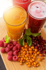 fruit drink with cranberries raspberries and sea buckthorn