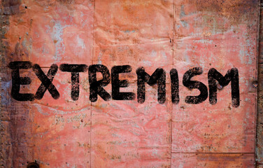 Extremism text on metal