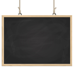 black board hanging on ropes