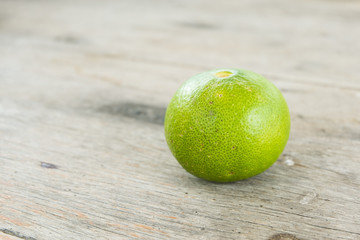 Lime fruit on the wood table