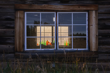 Old cabin window in Fort Selkirk on the Yukon river