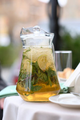 Lemonade pitcher at outdoor table