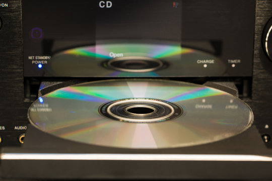 Selective focus cd and its reflection on the surface of a cd player
