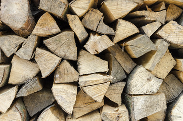 Firewood stacked. Close-up.