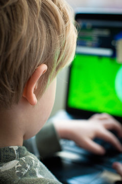 Young child looking at an online gambling website