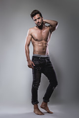Shirtless man posing seriously