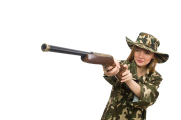 Fototapeta premium Girl in military uniform holding the gun isolated on white