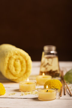 SPA still life with towel, candles and flowers