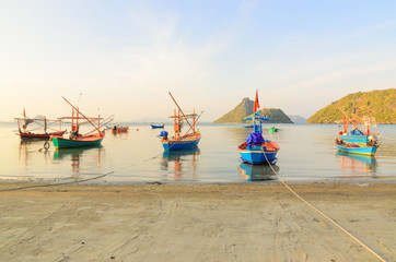 Fototapeta na wymiar Small fishing boats in the beach