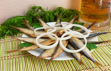 Smoked small fish (kilka, sprat, herring) and beer