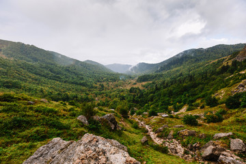 Fototapeta na wymiar Mountain Adygea fall. Overcast in the mountains of the Krasnodar Territory