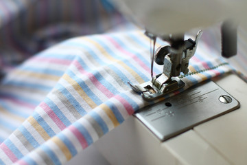 the sewing machine and striped fabric for a sheet