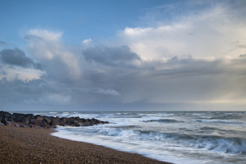 Stunningrocky beach sunset landscape long exposure