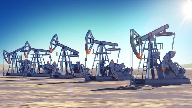 Oil Pumps at work in the desert. Sun Shining. Looped 3d animation. Business and Production Concept. HD 1080.